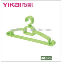 Plastic hanger with trousers bar and racks for straps